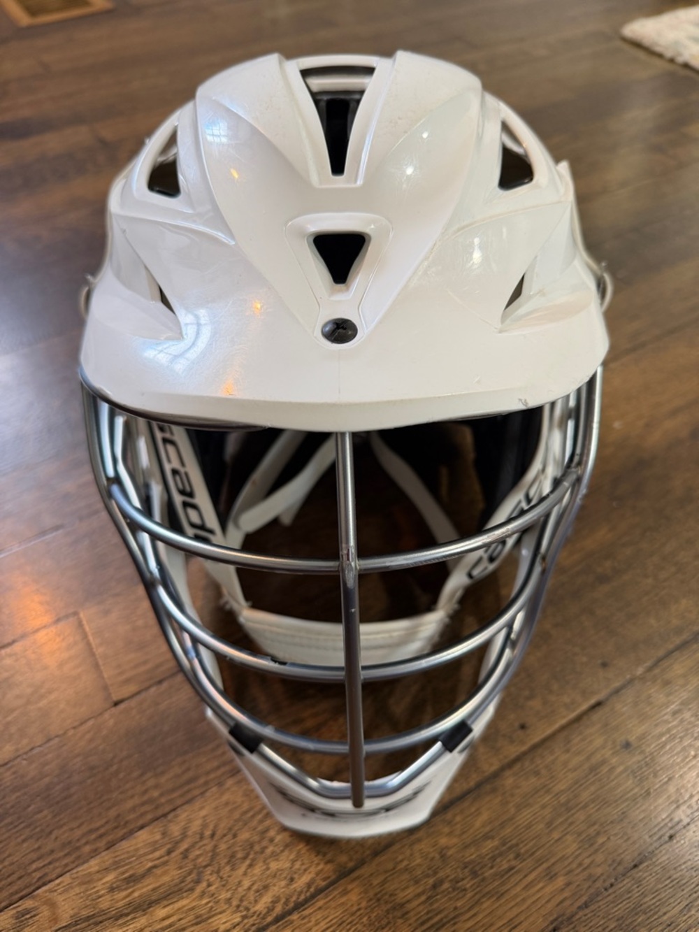 Cascade White Adjustable Lacrosse Helmet with Silver Face Cage